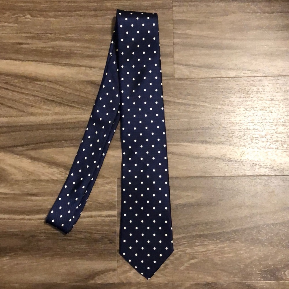 Blue and white polka dot tie